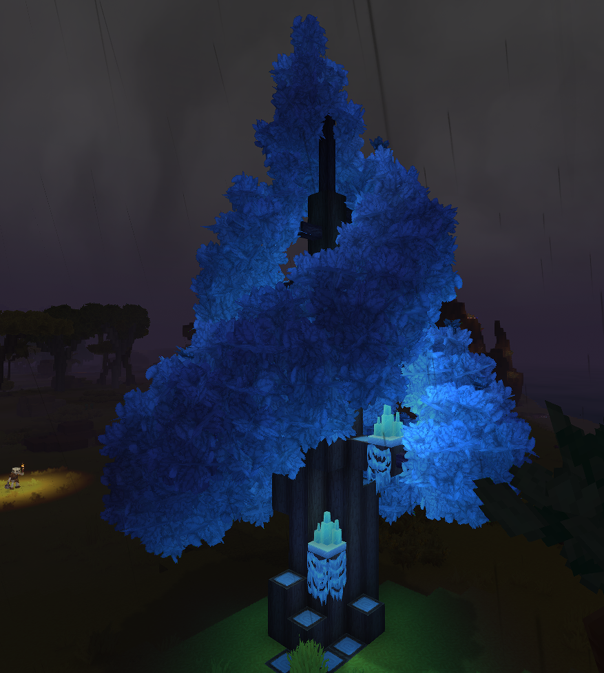 Fully grown Enchanted Tree at night showing blue crystal leaves, dark trunk with crystal moss, glowing Light Shard fruit, and Crystal Glow blocks at the base